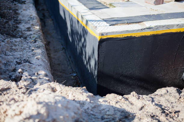 Professional Exterior Waterproofing technician working in Putnamville, IN